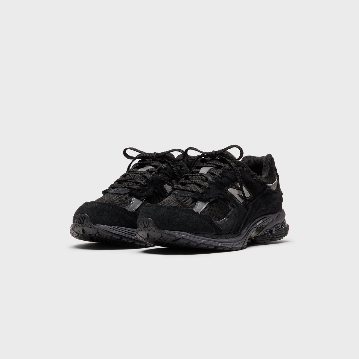 New Balance U2002DX - Black / Magnet